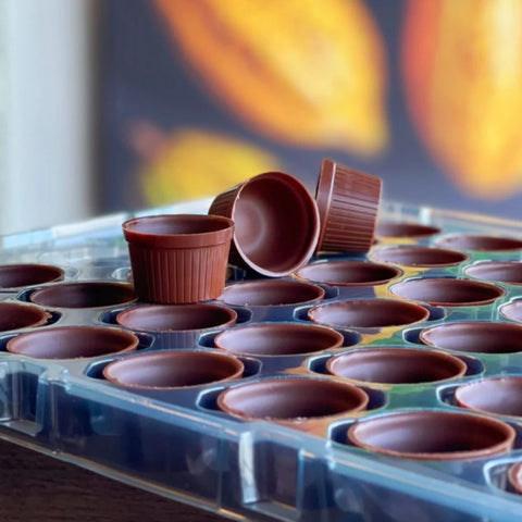 Chocolate cups a la carte with milk 